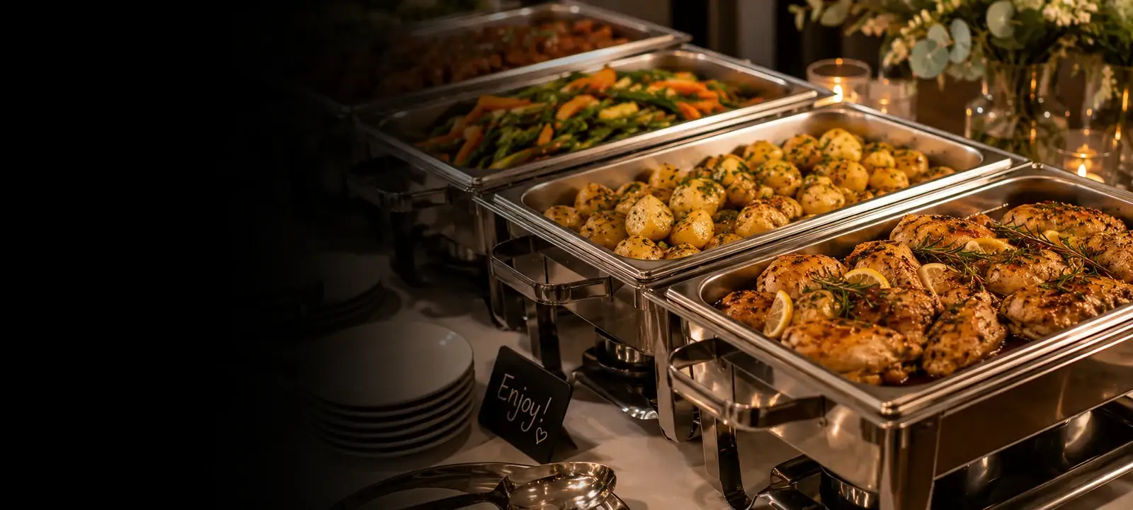Hot buffet spread laid out ready for guests at a festive event