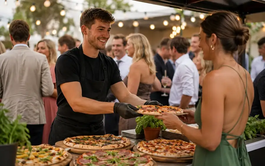 Margherita pizza sliced on a board ready for guests to help themselves