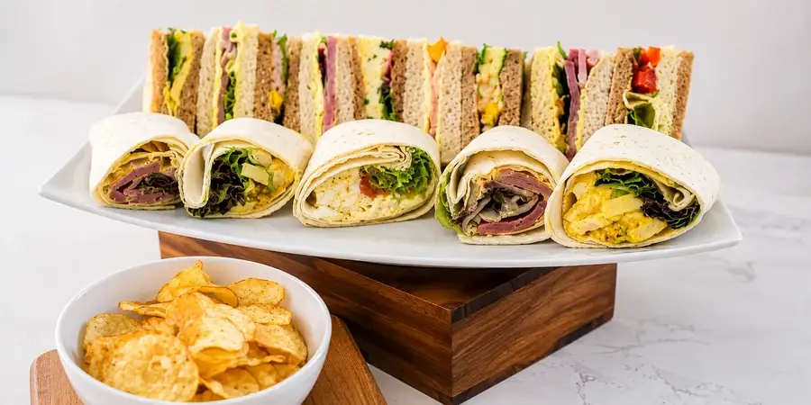 Buffet 2 — platters of sandwiches and wraps laid out for serving